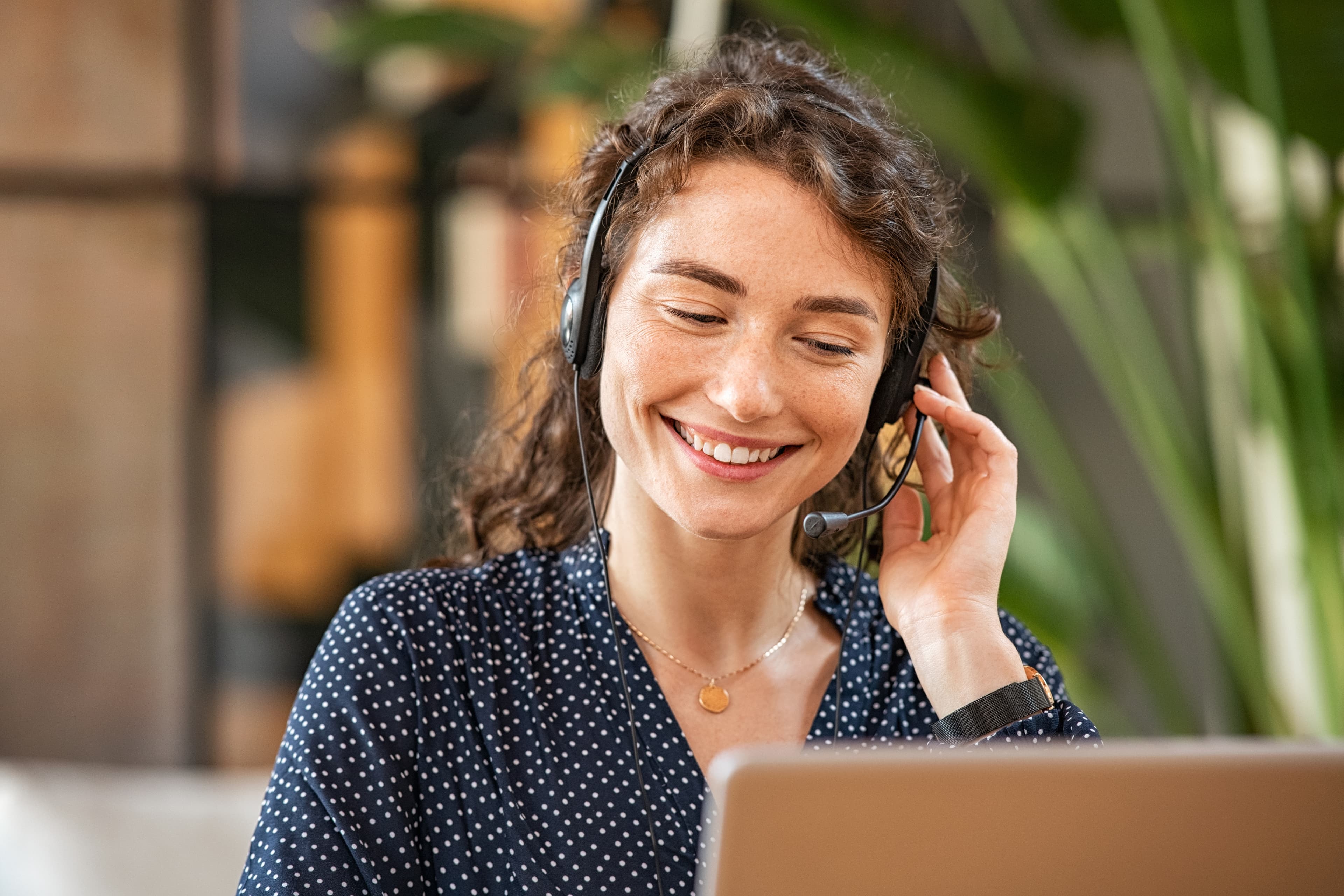 A Sola support specialist on a call with a member