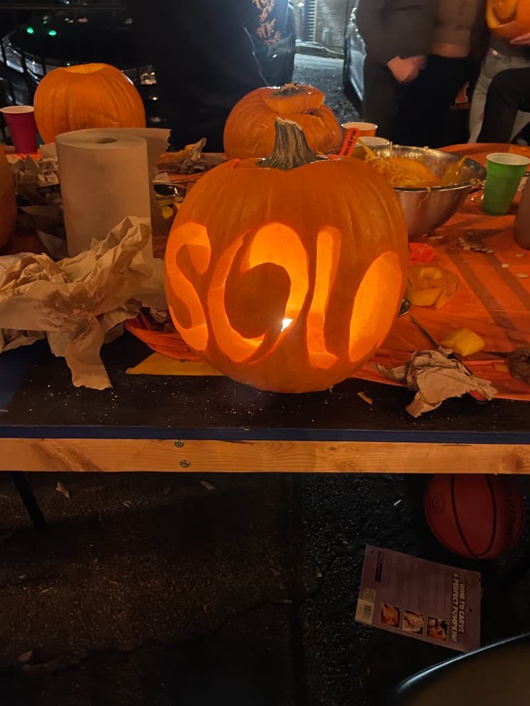 A Sola team member at a vintage Macintosh
